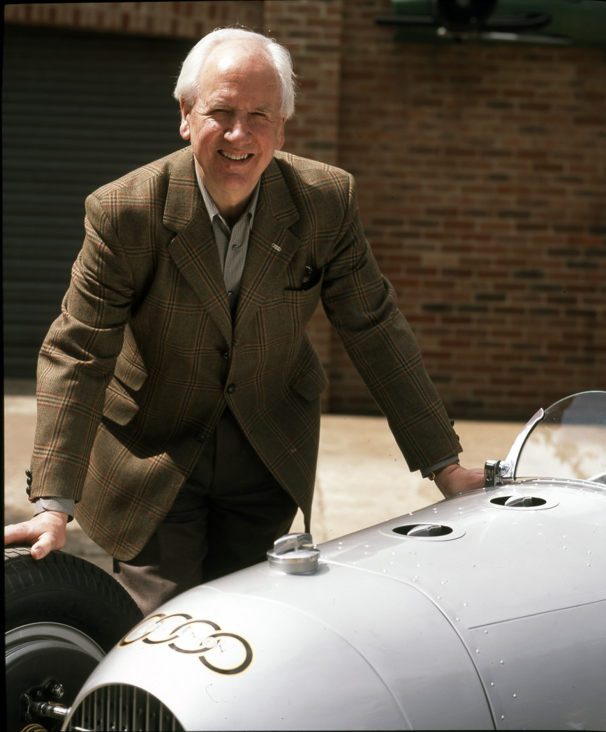 Photo of motorsport author Karl Ludvigsen with a pre-war Auto Union
